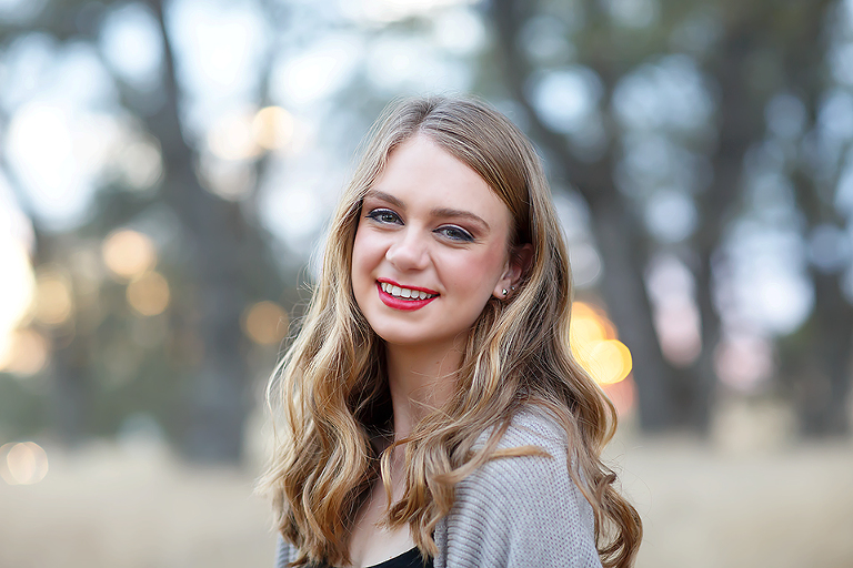 Fall photos with Class of 2016 Senior models - featuring red lips, plaid, sweaters, boots with senior photographer Colleen Sanders Photography in El Dorado Hills, California.