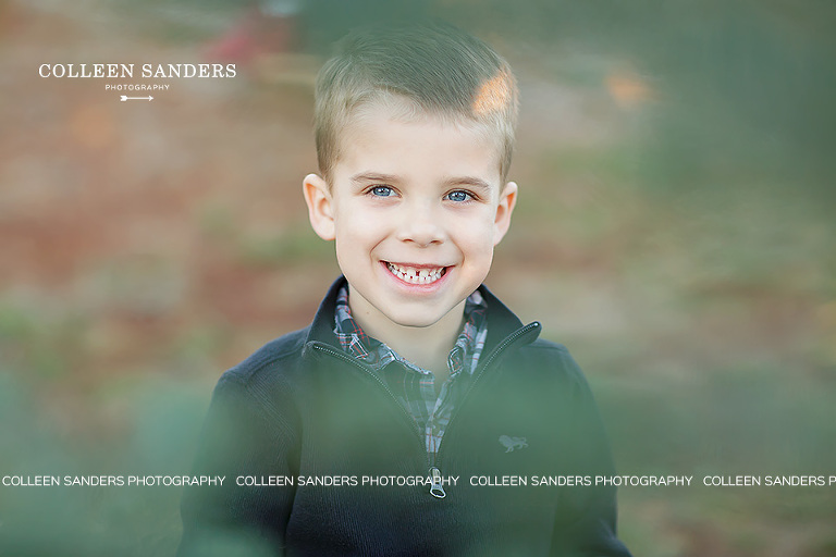 Family pictures at a Christmas tree farm by El Dorado Hills family photographer, Colleen Sanders.