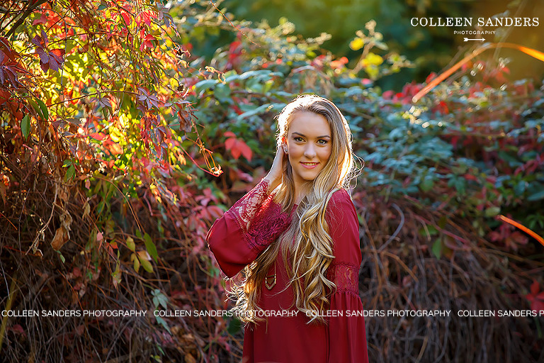 Fall senior portraits by El Dorado Hills senior photographer Colleen Sanders with Emily looking flawless in a red dress and golden light.