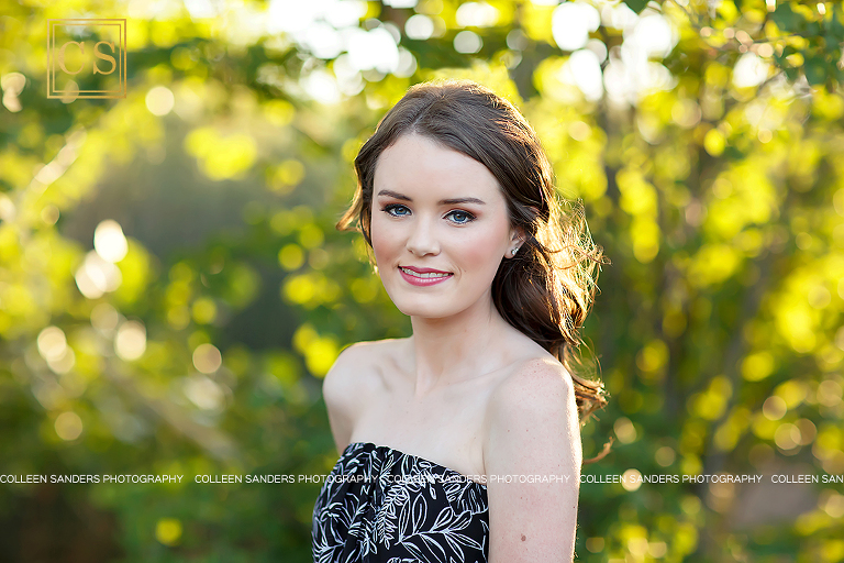 El Dorado Hills senior pictures with natural greenery, floral romper, beautiful natural makeup, by Colleen Sanders Photography.