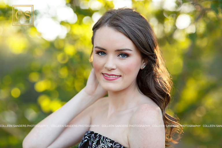 El Dorado Hills senior pictures with natural greenery, floral romper, beautiful natural makeup, by Colleen Sanders Photography.