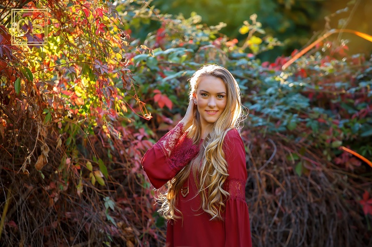Colleen Sanders Photography senior pictures girl red dress, gold jewelry, hat, fall portraits, back light, golden hour.