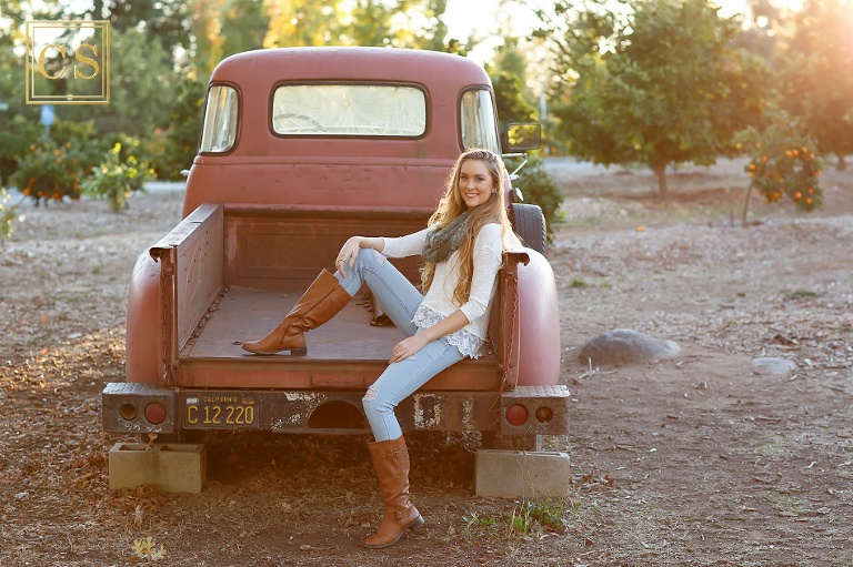 Colleen Sanders Photography senior pictures girl leaves, fall, lace, truck, golden hour, back light.