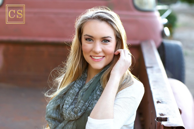 Colleen Sanders Photography senior pictures girl leaves, fall, lace, truck, golden hour, close up.