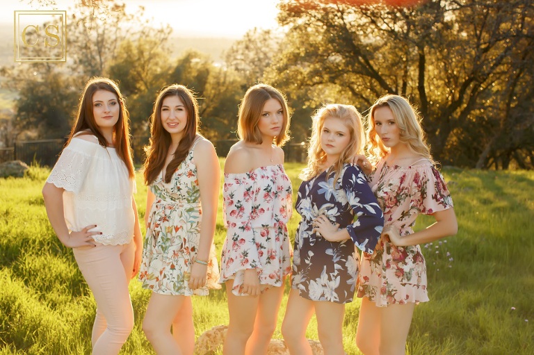 Senior models in El Dorado Hills golden hour cupcake flower theme session with Colleen Sanders Photography. 