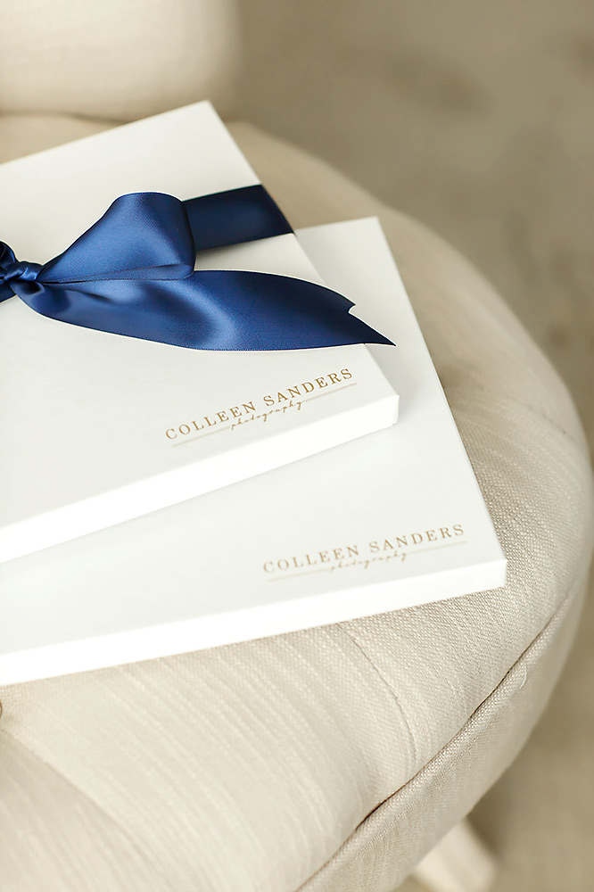 Senior photographer Colleen Sanders in El Dorado Hills luxury packaging prints.