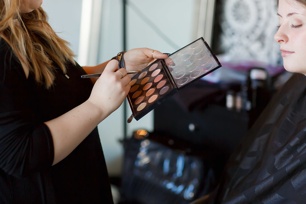 professional hair and makeup for every senior session, getting ready in the salon with colleen sanders photography.
