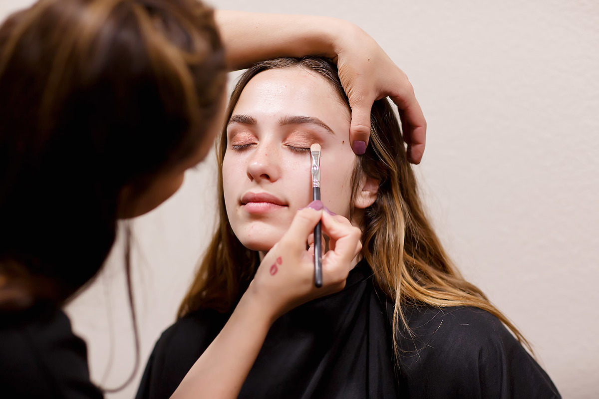 professional hair and makeup for every senior session, getting ready in the salon with colleen sanders photography.