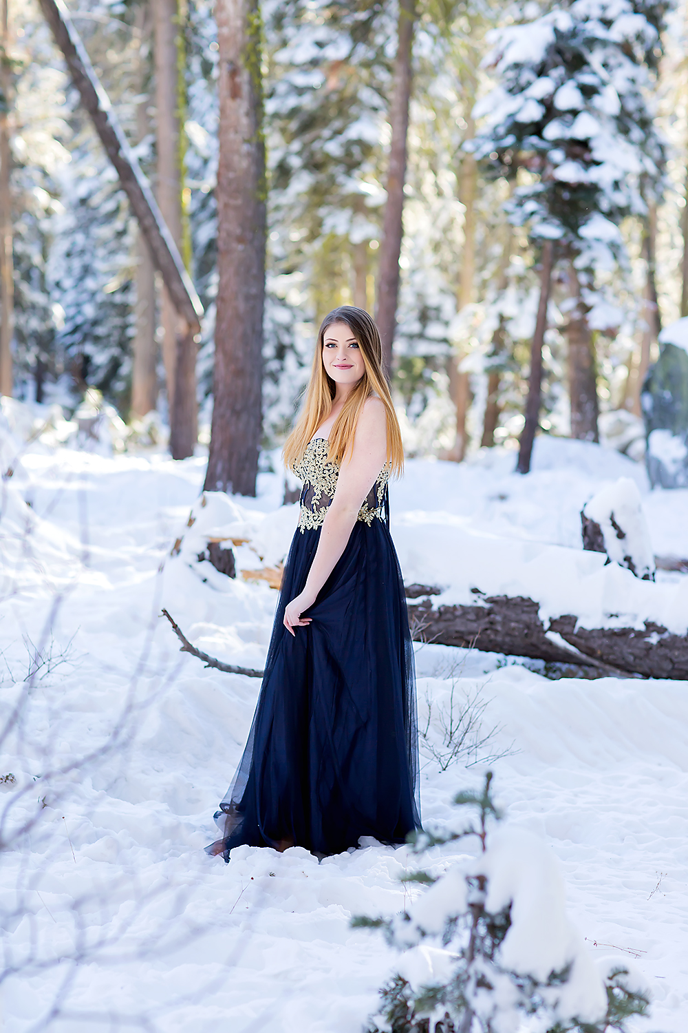 Senior Model team destination session in snow in Tahoe, California by El Dorado Hills senior Photographer Colleen Sanders, formal, prom dress, winter.