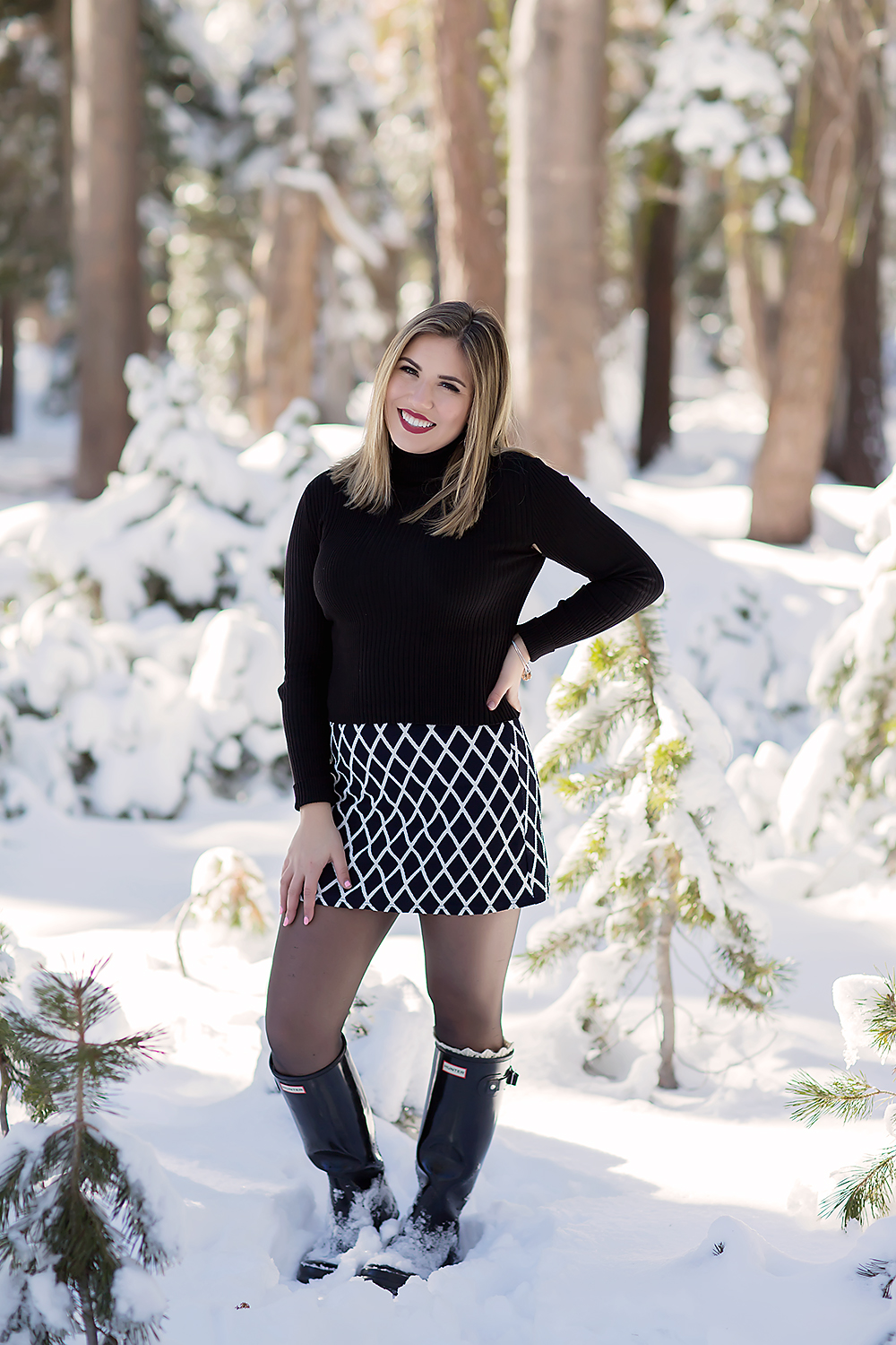 Senior session in snow in Tahoe, California by Colleen Sanders Photography hunter boots.