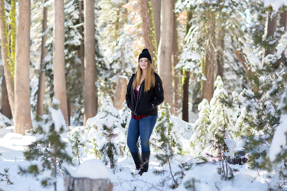 Senior session in snow, beanie, hat, cozy, winter wonderland by Colleen Sanders Photography in Tahoe, California.